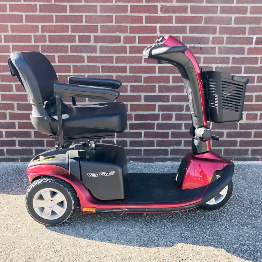 Pride Victory 10 three wheel mobility scooter in red, right side view