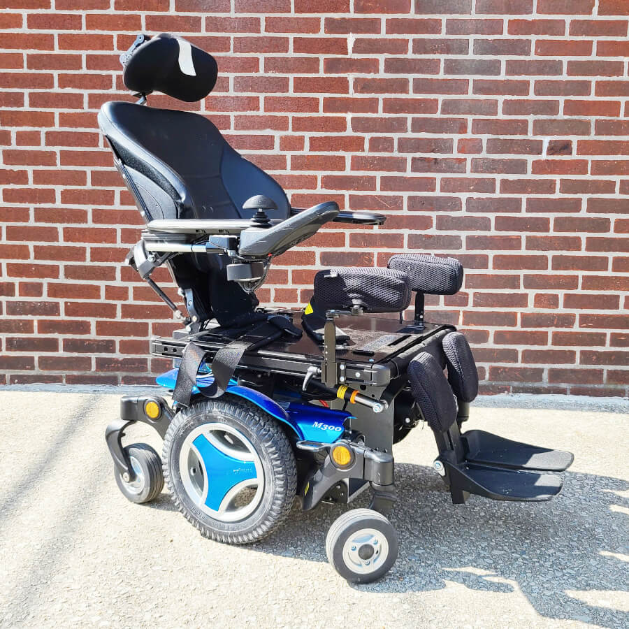 Permobil M300 Power Wheelchair in blue - three quarter view